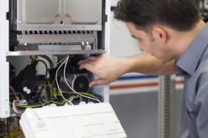 HVAC-technician-performing-heating-repair